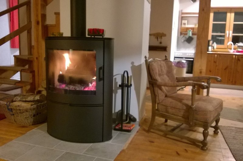 A wood stove is available for cozy evenings by the fireplace.