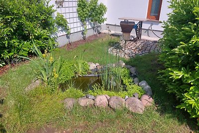 Ferienhaus mit Gartenblick