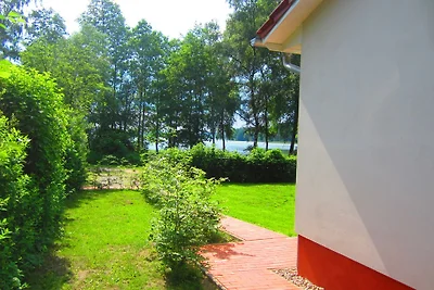 FH Dompfaff mit Boot & Steg am See