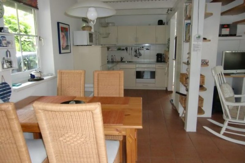 Dining area with fully equipped kitchen