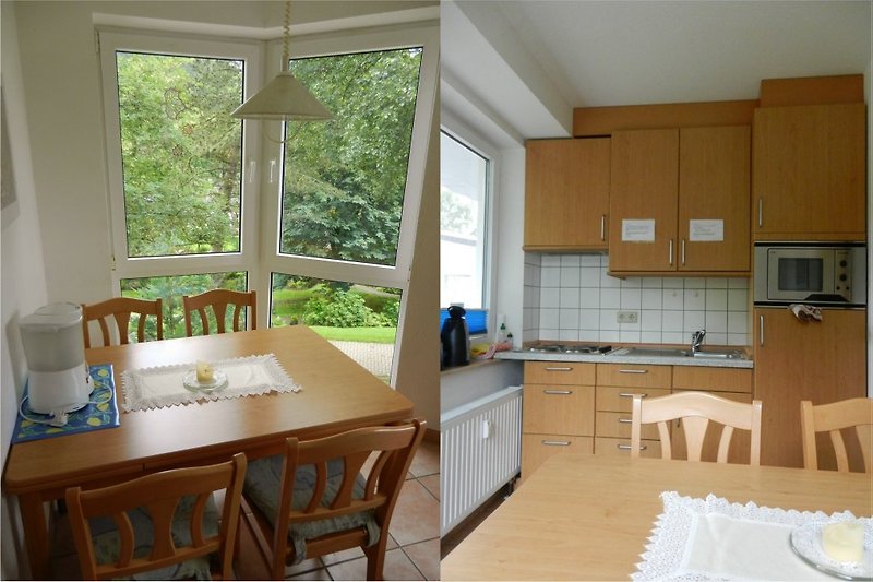 Fewo D*** - separate kitchen with dining area and view of the spa park.