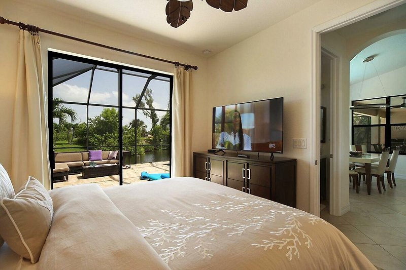 Stilvolles Schlafzimmer mit gemütlichem Holzbett und stilvoller Beleuchtung.