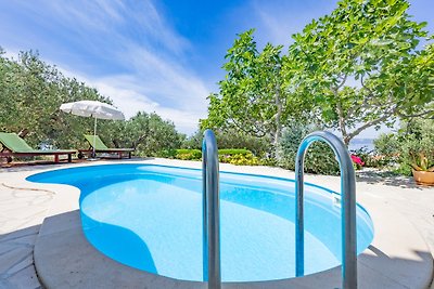 Ferienhaus Elly  Pool und Meerblick