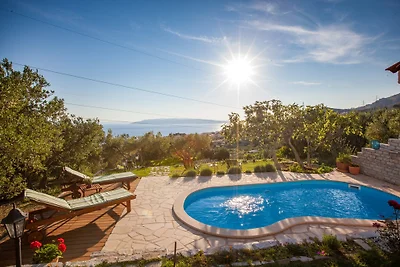 Ferienhaus Elly  Pool und Meerblick