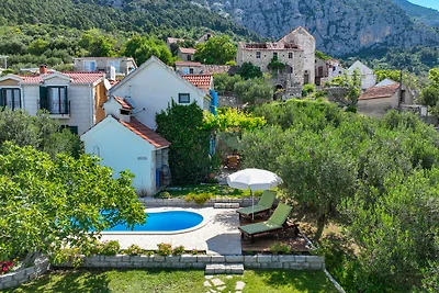 Ferienhaus Elly  Pool und Meerblick
