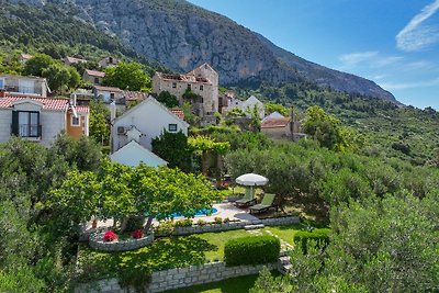 Ferienhaus Elly  Pool und Meerblick