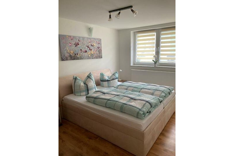 1. Schlafzimmer mit Doppelbett