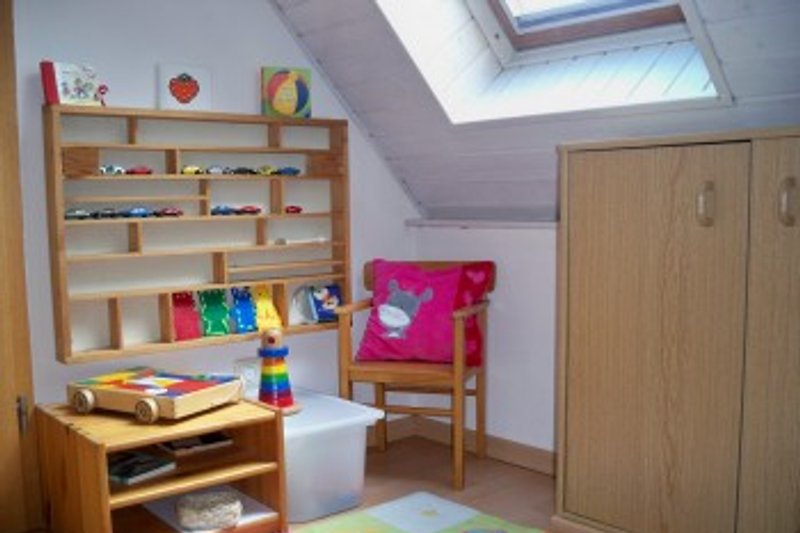 Children's play area, and there are also many books and games available for children and adults