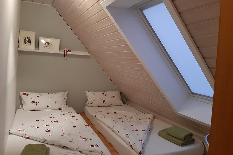 2 single beds in bedroom 2
