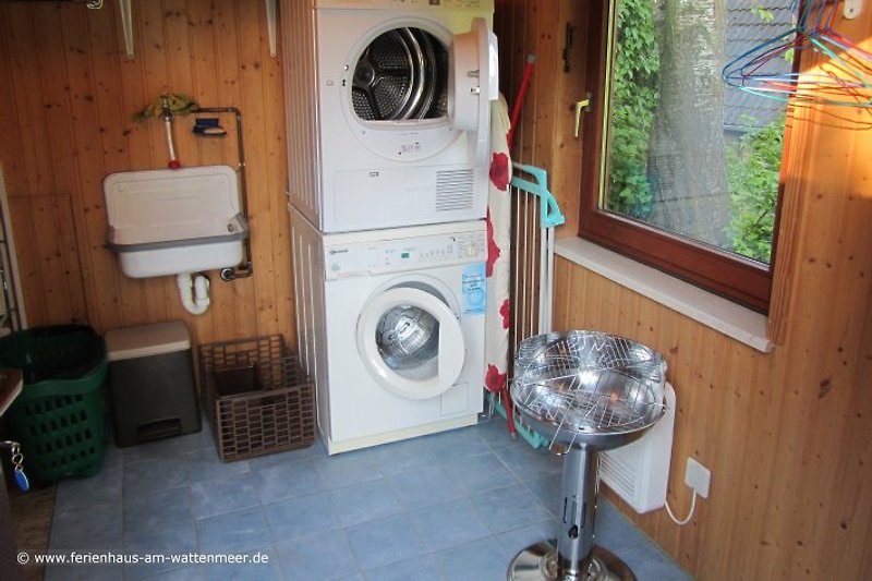 Extension with washing machine and dryer