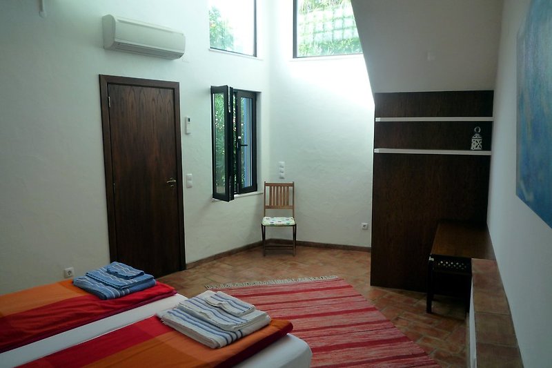 Bedroom with exit to the living area
