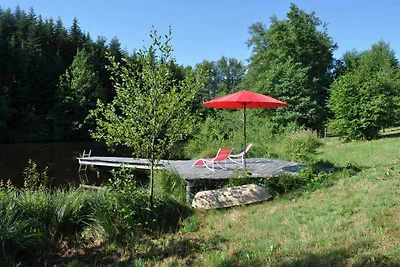 Chalet nella riserva naturale con il lago