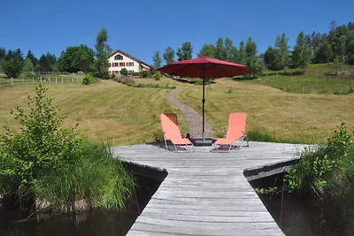 Camera doppia in casa di campagna con lago balneabile privato