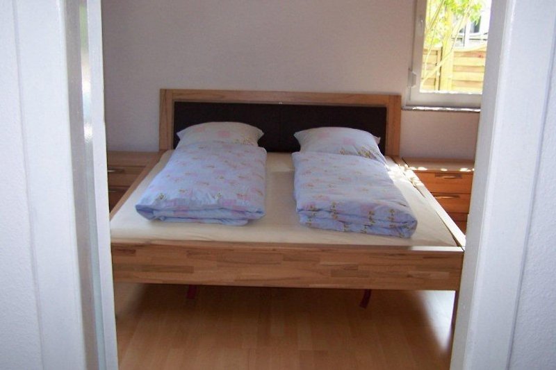 Double bed in the larger ground floor apartment