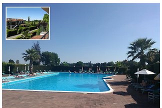 Appartamento C 46 al primo piano, con giardino e piscina