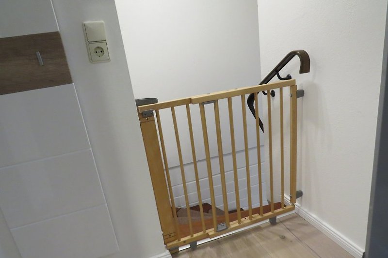 Schwenk-Treppenschutzgitter für einen sicheren Urlaub in unserem Hause