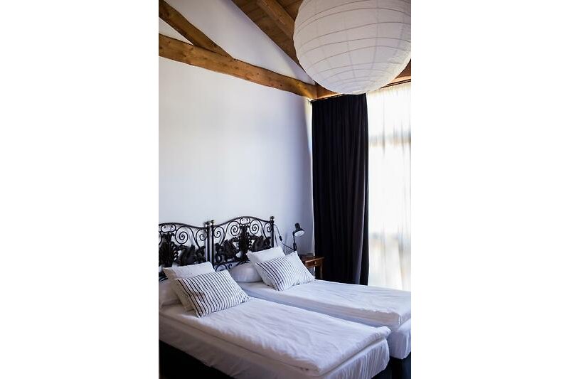 Eines von 3 Schlafzimmern (Corte Villa Donati)