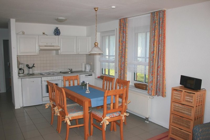 Dining area with kitchenette (example).