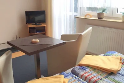 Camera per vacanze con cucina e terrazza