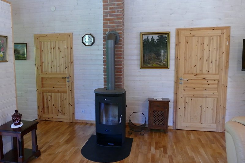 The wood-burning stove heats the entire house.
