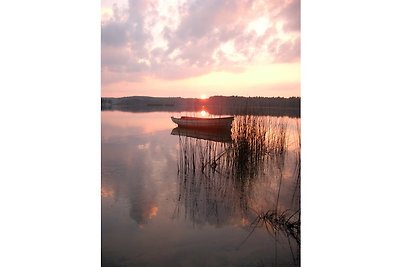 Casa sul lago con vasca idromassaggio esterna