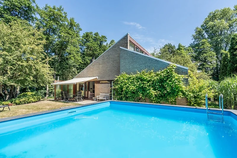 Het gezellige familiehuis met verwarmd zwembad