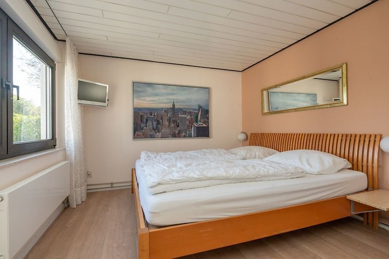 Slaapkamer met tweepersoonsbed (180x200)