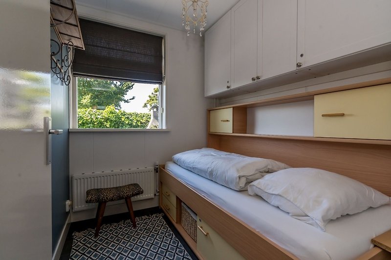 Slaapkamer 2 met een eenpersoonsbed