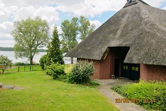 Reetdach-Ferienhaus + Seeblick
