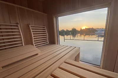 Hausboot Haveltänzer: Panorama Sauna & Beiboot für Erkundungstouren