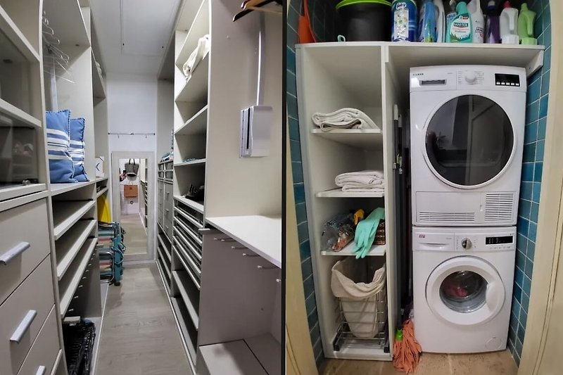Cuarto de lavado con lavadora, secadora y estantes para productos de lavandería.