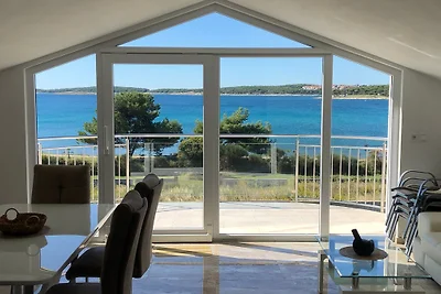 Ferienhaus private Strandparzelle