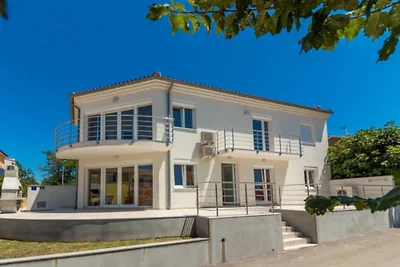 Ferienhaus private Strandparzelle