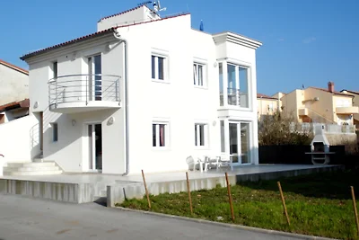 Ferienhaus private Strandparzelle