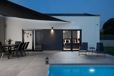 Modern villa with pool in a small p