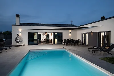 Modern villa with pool in a small p