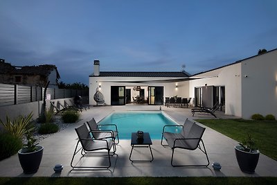 Modern villa with pool in a small p