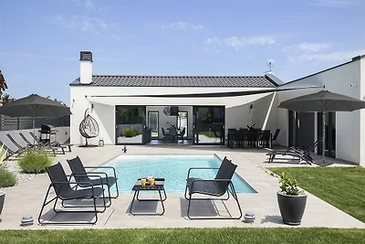 Modern villa with pool in a small p