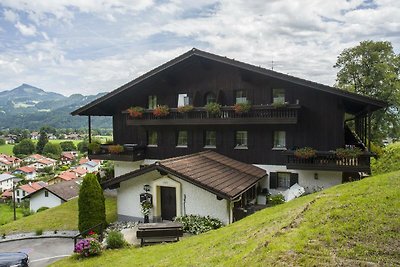 Country house still with large corner balcony...