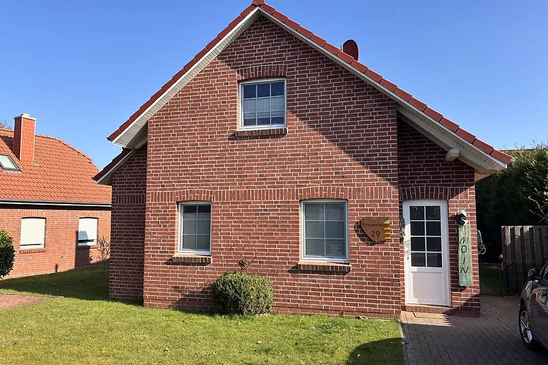 Unser Ferienhaus mit Platz für 6 Personen und einem eingezäunten Garten