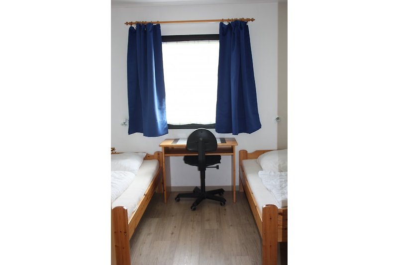 Slaapkamer met 2 bedden