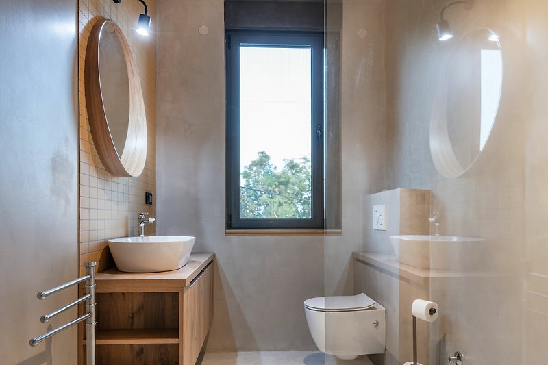 Die Badezimmer sind modern und mit allen Annehmlichkeiten ausgestattet, die Sie benötigen