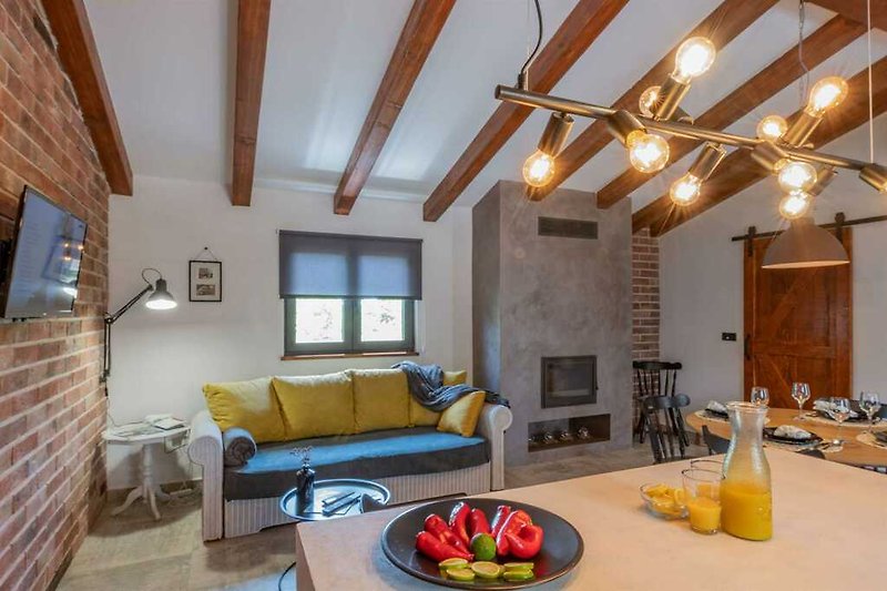 Genießen Sie entspannte Momente im ruhigen Wohnbereich von Villa Casa di Nonna Ida.