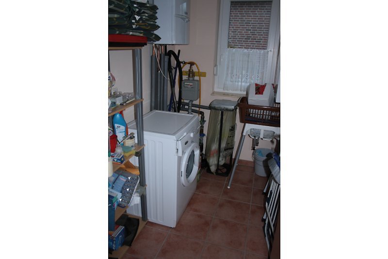 Storage room with washing machine