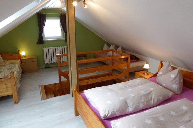 the bedroom offers space for up to 4 people