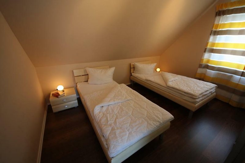 Schlafzimmer mit Einzelbetten - Erholung pur