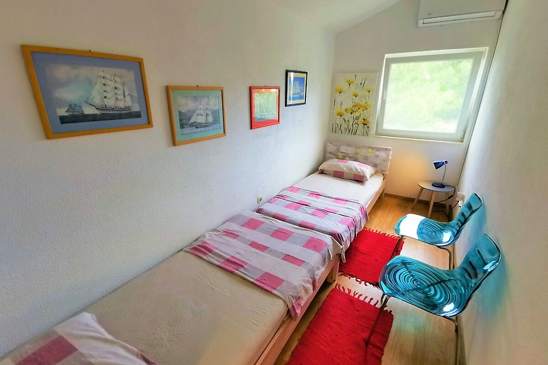 Villa Marela bedroom with two single beds