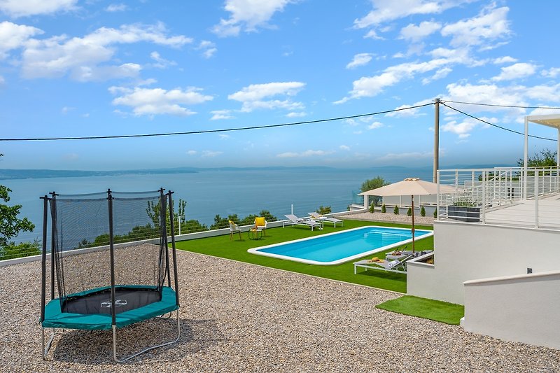 A private 33sqm swimming pool, a fully fenced playground for your youngest, a trampoline, and table tennis.
