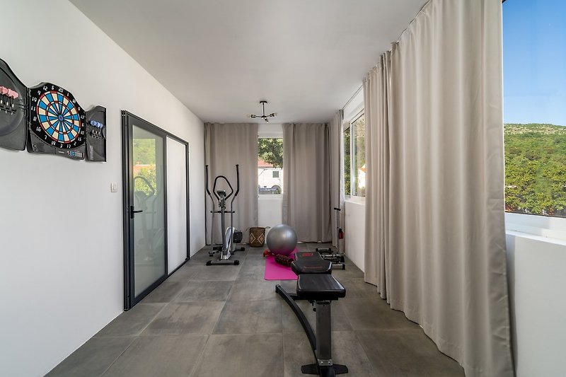 fitness room with serveral equipment