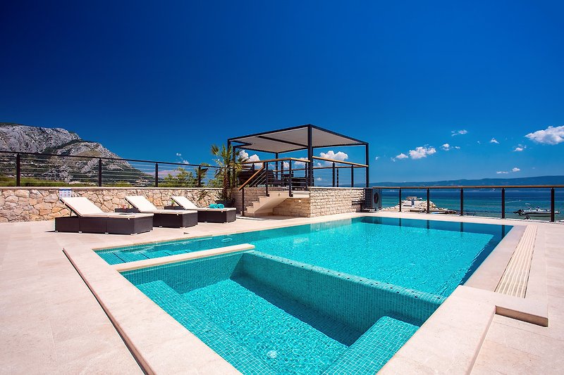 Beachfront Villa Draga with 32sqm private, heated pool